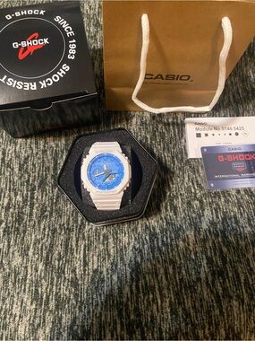 G-Shock White Watch with Blue Dial and White Strap